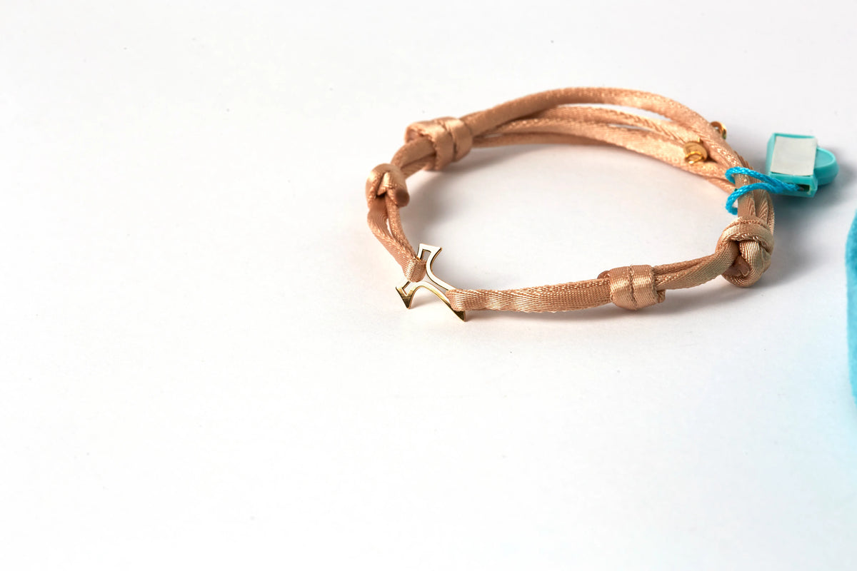 Bracciale Satin-Line con croce Tao